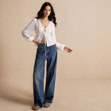 Tie Front Hem Slits Hollow Out Long Sleeve Loose V-Neck Blouse.