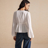 Tie Front Hem Slits Hollow Out Long Sleeve Loose V-Neck Blouse.