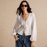 Tie Front Hem Slits Hollow Out Long Sleeve Loose V-Neck Blouse.