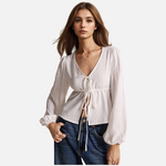 Tie Front Hem Slits Hollow Out Long Sleeve Loose V-Neck Blouse.